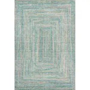 Photo of Teal And Ivory Geometric Washable Area Rug With UV Protection