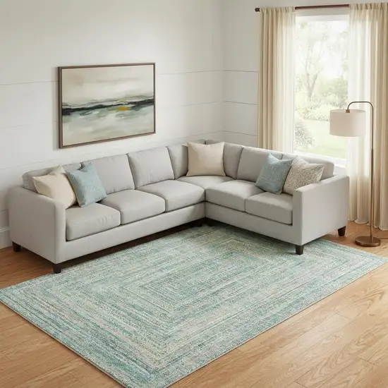 Teal And Ivory Geometric Washable Area Rug With UV Protection Photo 2