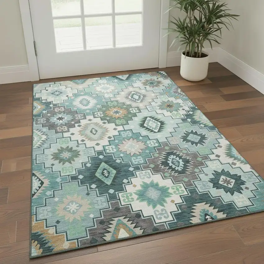 Teal And Ivory Geometric Washable Area Rug With UV Protection Photo 1