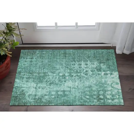 Teal And Ivory Ikat Washable Area Rug With UV Protection Photo 2