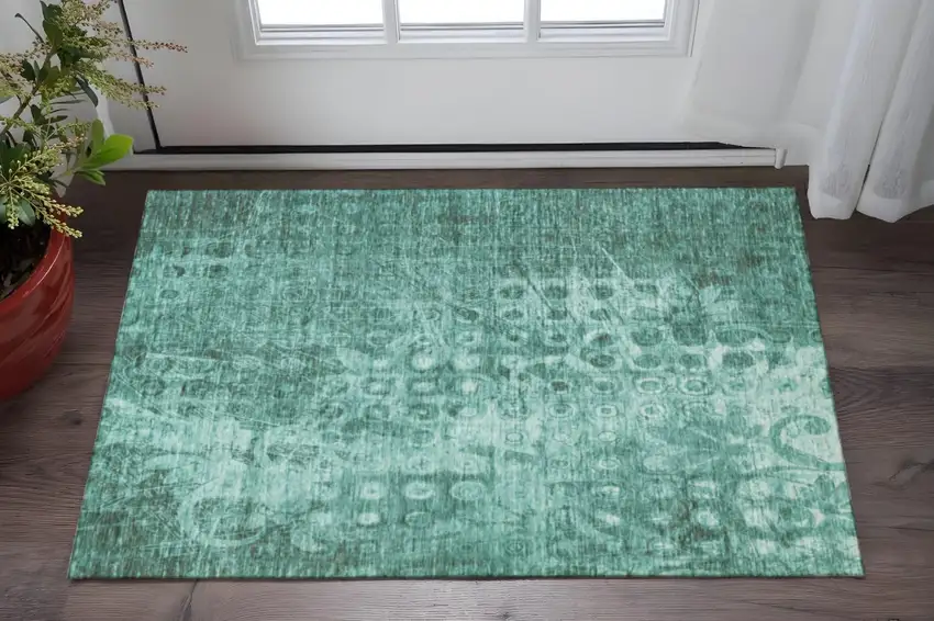 Teal And Ivory Ikat Washable Area Rug With UV Protection Photo 2