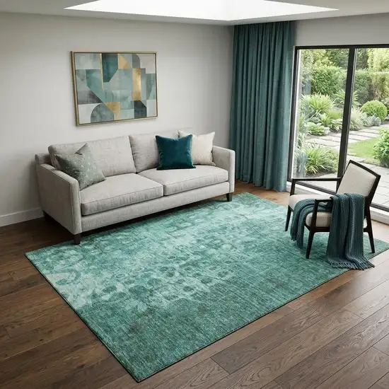 Teal And Ivory Ikat Washable Area Rug With UV Protection Photo 1