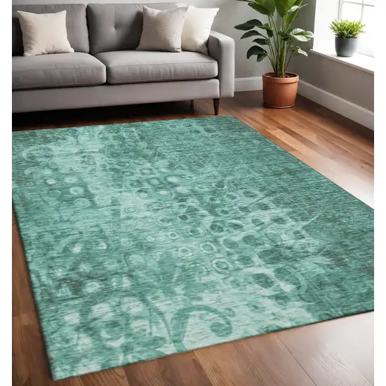 Teal And Ivory Ikat Washable Area Rug With UV Protection Photo 2