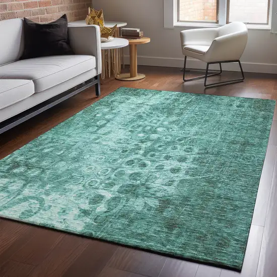 Teal And Ivory Ikat Washable Area Rug With UV Protection Photo 3
