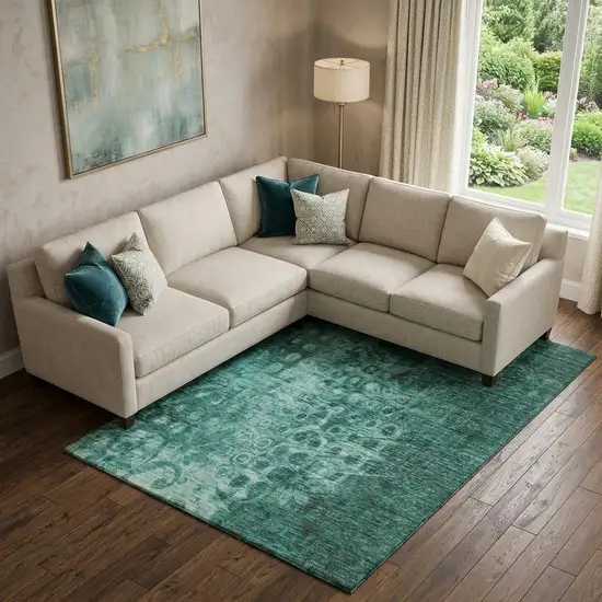 Teal And Ivory Ikat Washable Area Rug With UV Protection Photo 1