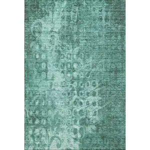 Photo of Teal And Ivory Ikat Washable Area Rug With UV Protection