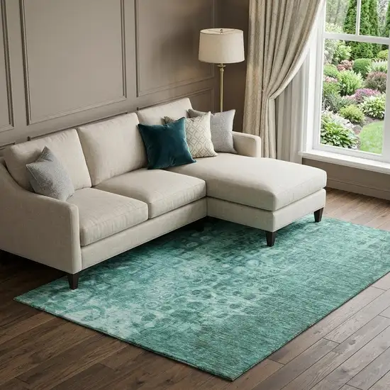 Teal And Ivory Ikat Washable Area Rug With UV Protection Photo 1