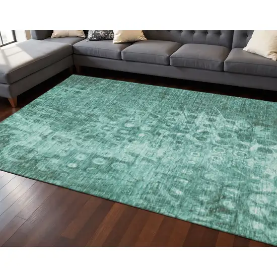 Teal And Ivory Ikat Washable Area Rug With UV Protection Photo 2