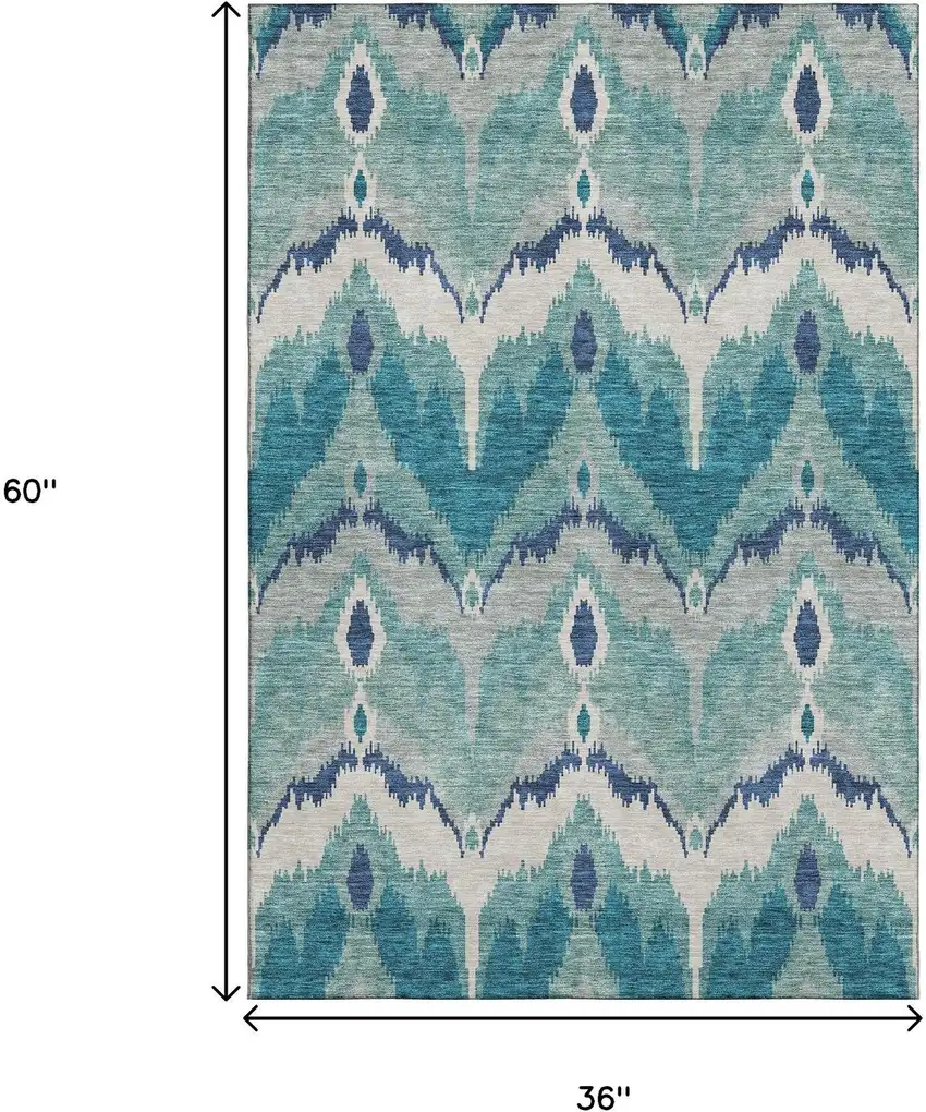 Teal And Ivory Ikat Washable Area Rug With UV Protection Photo 3