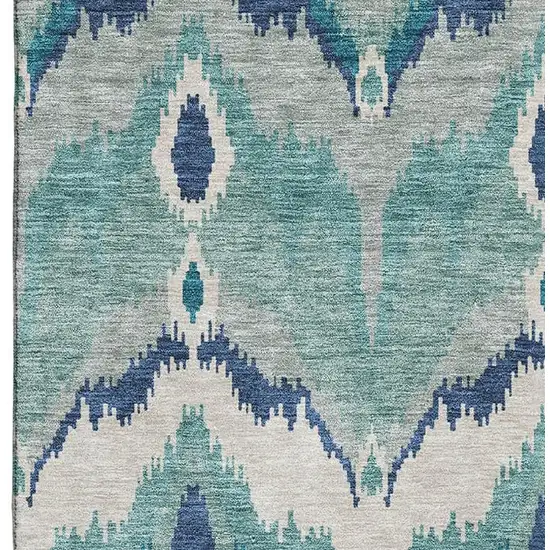 Teal And Ivory Ikat Washable Area Rug With UV Protection Photo 3