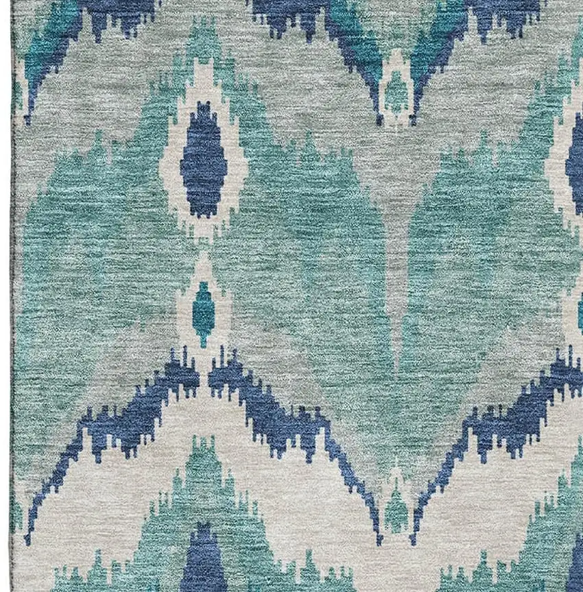 Teal And Ivory Ikat Washable Area Rug With UV Protection Photo 4
