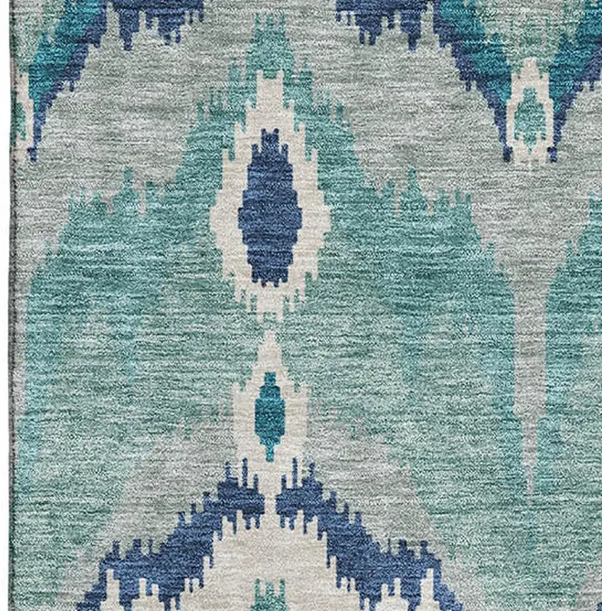 Teal And Ivory Ikat Washable Area Rug With UV Protection Photo 3