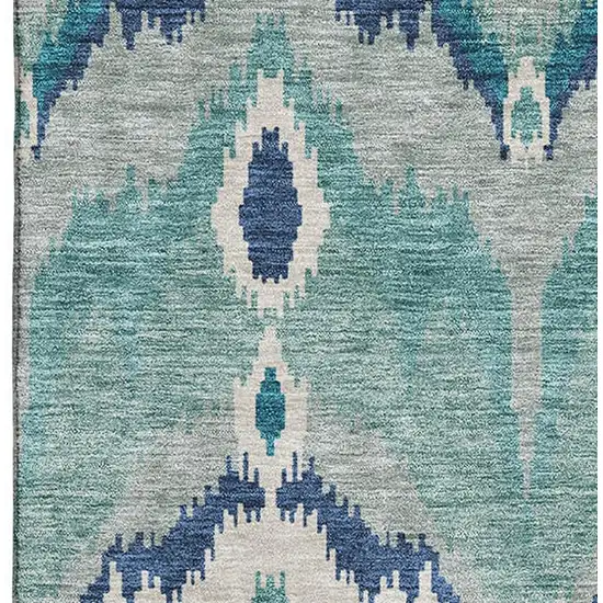 Teal And Ivory Ikat Washable Area Rug With UV Protection Photo 3