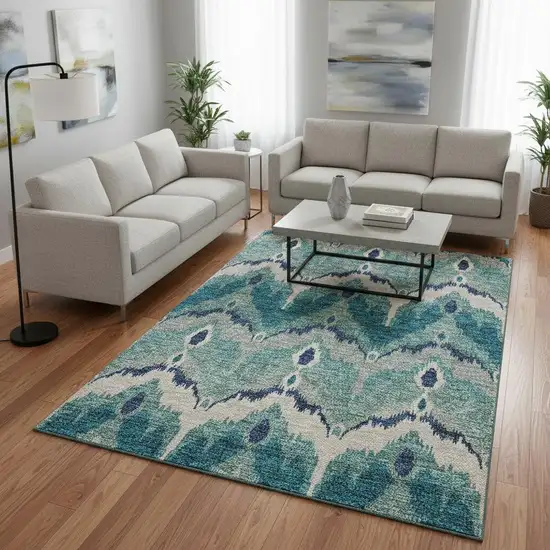 Teal And Ivory Ikat Washable Area Rug With UV Protection Photo 2