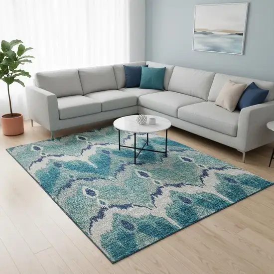 Teal And Ivory Ikat Washable Area Rug With UV Protection Photo 2