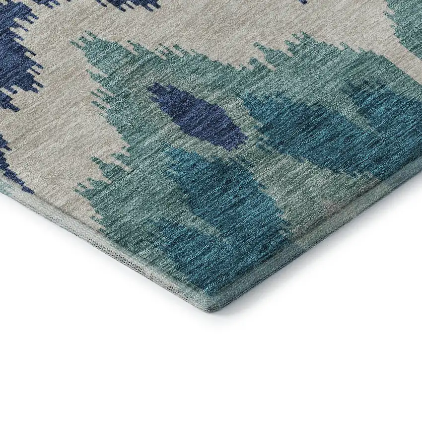 Teal And Ivory Ikat Washable Area Rug With UV Protection Photo 8
