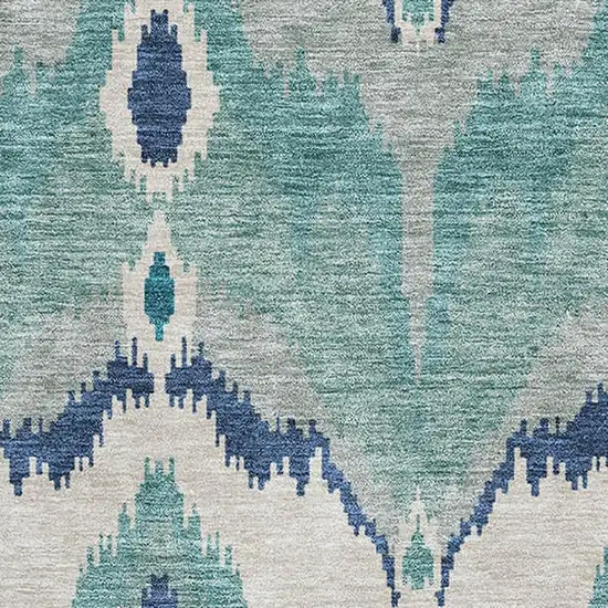 Teal And Ivory Ikat Washable Area Rug With UV Protection Photo 3