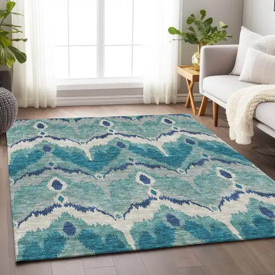 Teal And Ivory Ikat Washable Area Rug With UV Protection Photo 5