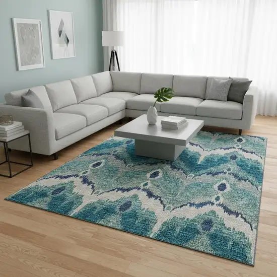 Teal And Ivory Ikat Washable Area Rug With UV Protection Photo 2