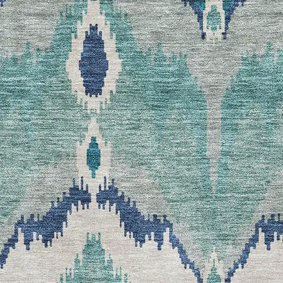 Teal And Ivory Ikat Washable Area Rug With UV Protection Photo 3