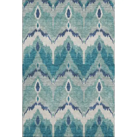 Teal And Ivory Ikat Washable Area Rug With UV Protection Photo 1