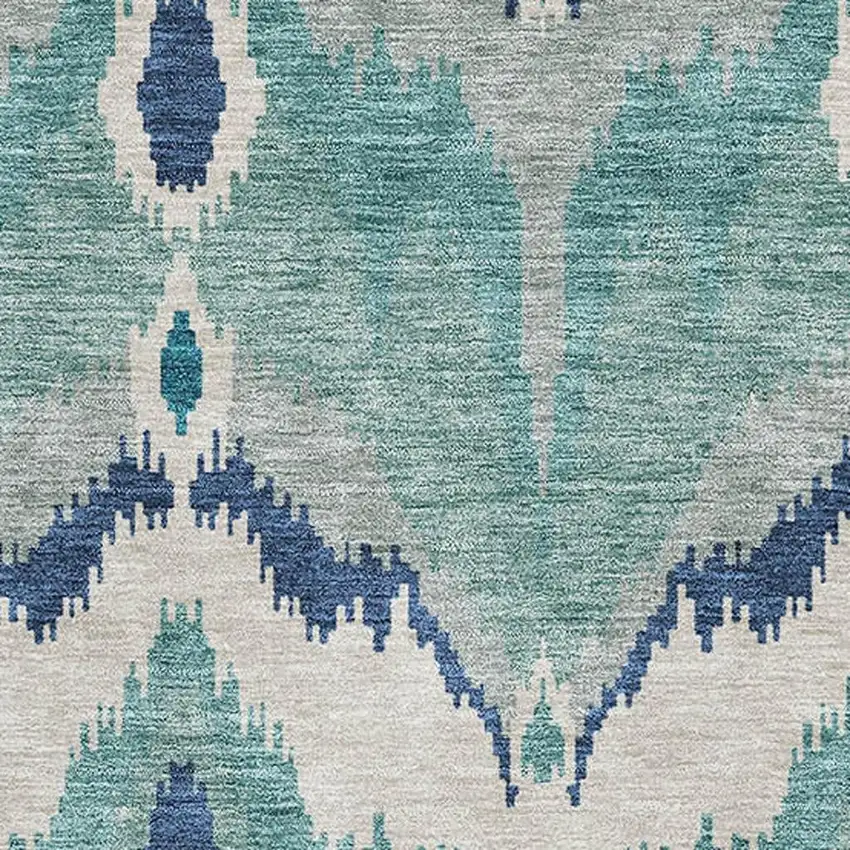 Teal And Ivory Ikat Washable Area Rug With UV Protection Photo 3