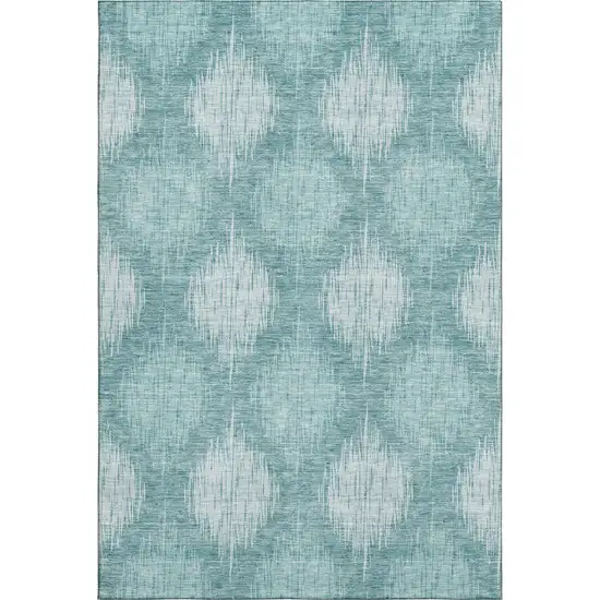 Teal And Ivory Ikat Washable Area Rug With UV Protection Photo 1