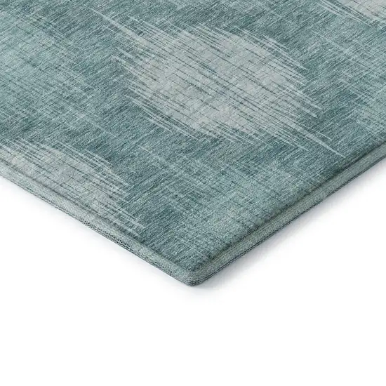 Teal And Ivory Ikat Washable Area Rug With UV Protection Photo 8