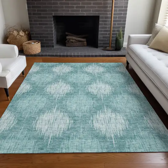 Teal And Ivory Ikat Washable Area Rug With UV Protection Photo 5