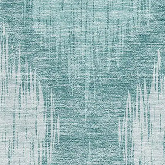 Teal And Ivory Ikat Washable Area Rug With UV Protection Photo 3