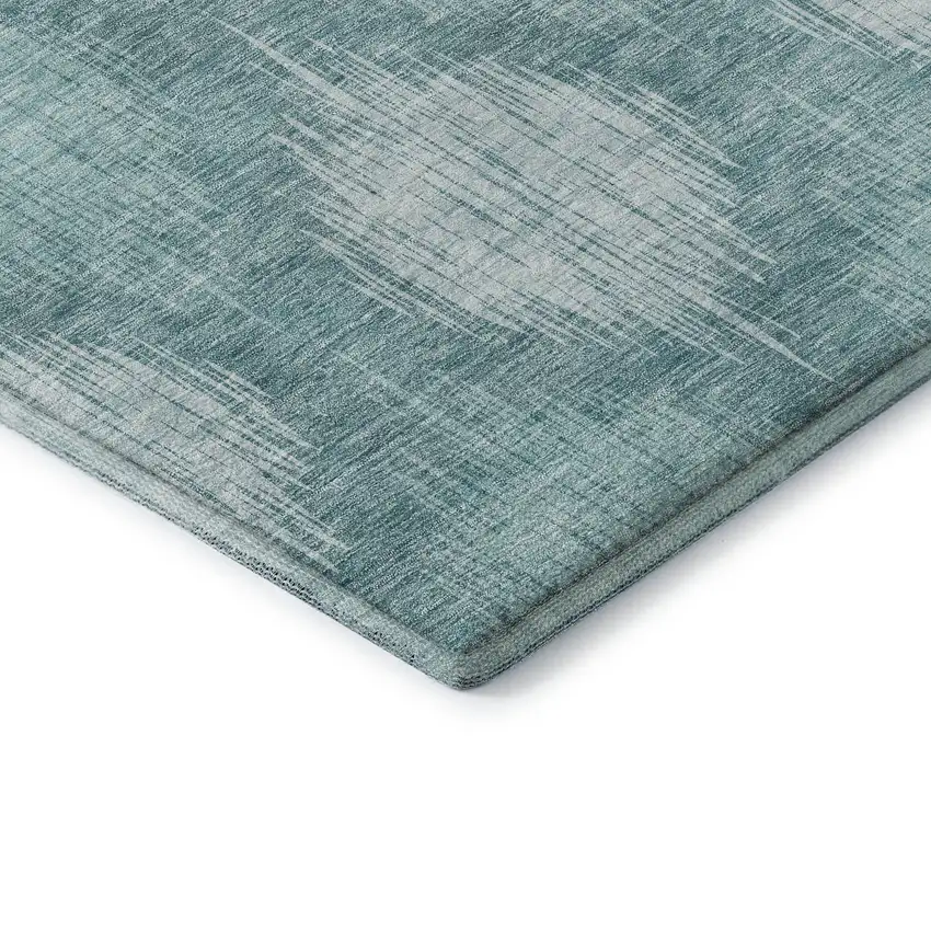 Teal And Ivory Ikat Washable Area Rug With UV Protection Photo 8