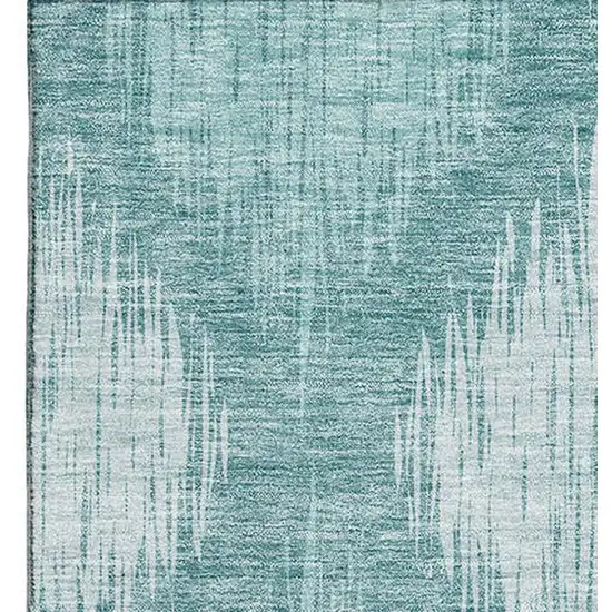 Teal And Ivory Ikat Washable Area Rug With UV Protection Photo 4