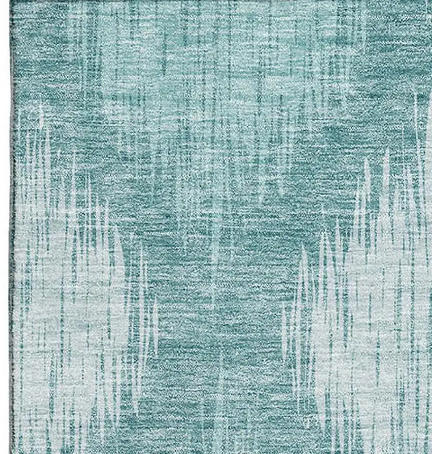Teal And Ivory Ikat Washable Area Rug With UV Protection Photo 4
