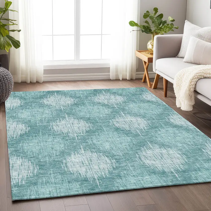 Teal And Ivory Ikat Washable Area Rug With UV Protection Photo 6