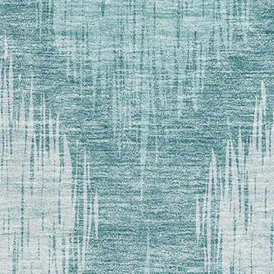 Teal And Ivory Ikat Washable Area Rug With UV Protection Photo 3