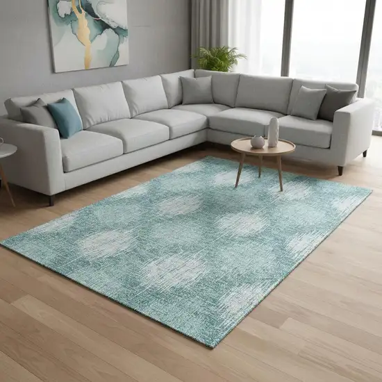 Teal And Ivory Ikat Washable Area Rug With UV Protection Photo 2