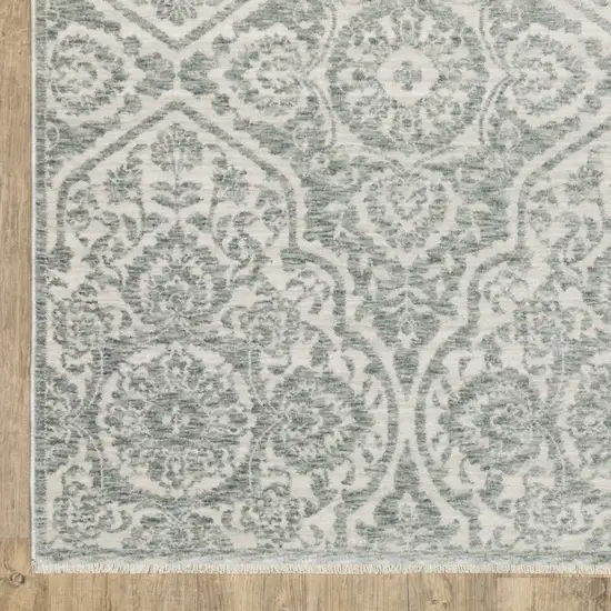 Teal And Ivory Medallion Area Rug With Fringe Photo 6