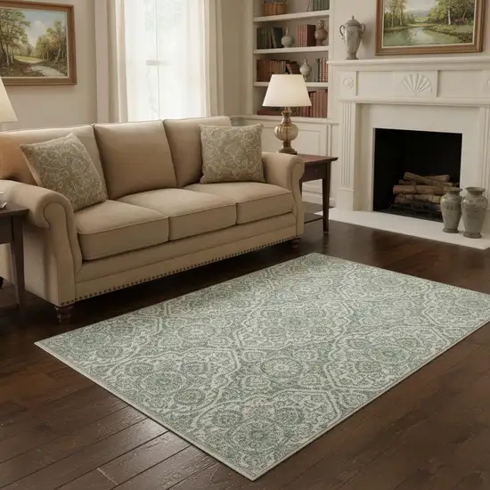 Teal And Ivory Medallion Area Rug With Fringe Photo 1