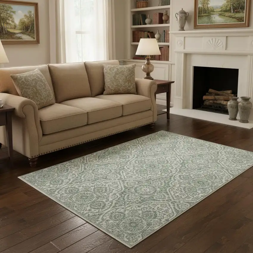 Teal And Ivory Medallion Area Rug With Fringe Photo 1