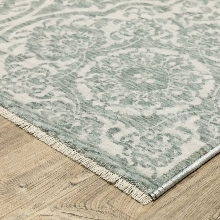 Teal And Ivory Medallion Area Rug With Fringe Photo 4