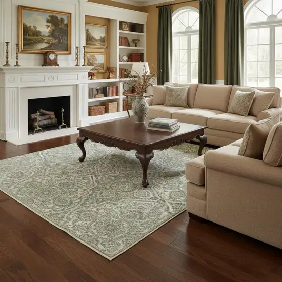 Teal And Ivory Medallion Area Rug With Fringe Photo 1