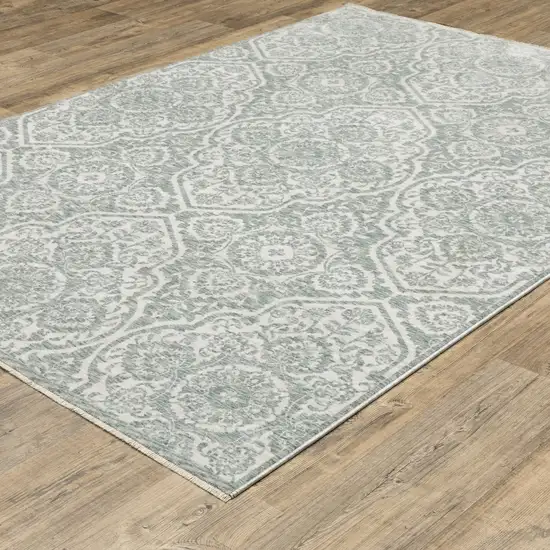 Teal And Ivory Medallion Area Rug With Fringe Photo 4