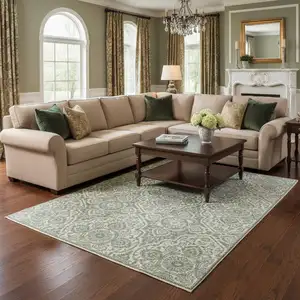 Photo of Teal And Ivory Medallion Area Rug With Fringe