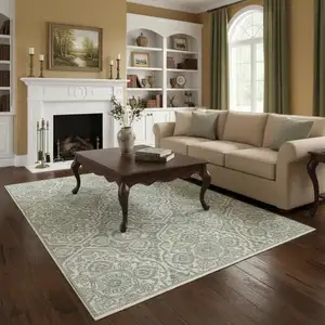 Photo of Teal And Ivory Medallion Area Rug With Fringe