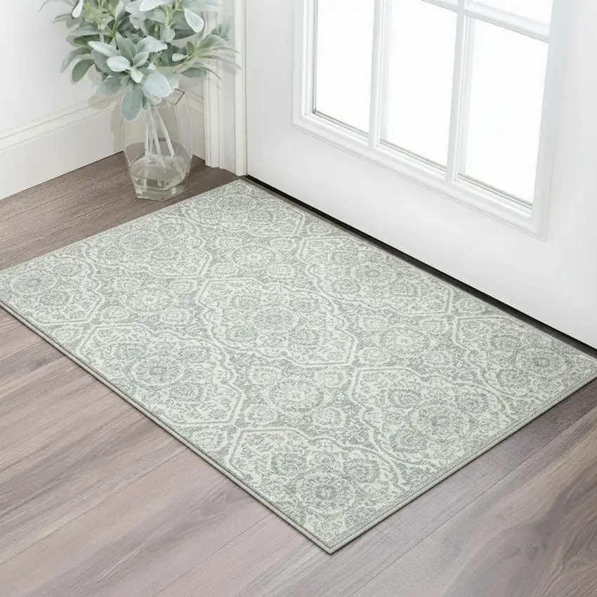 Teal And Ivory Medallion Area Rug With Fringe Photo 1