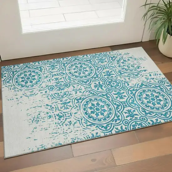 Teal And Ivory Medallion Washable Area Rug With UV Protection Photo 1