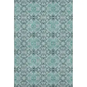 Photo of Teal And Ivory Medallion Washable Area Rug With UV Protection