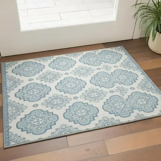 Teal And Ivory Medallion Washable Area Rug With UV Protection Photo 2