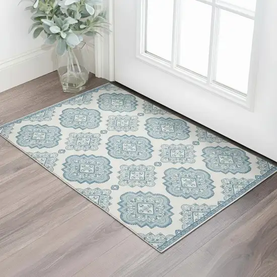 Teal And Ivory Medallion Washable Area Rug With UV Protection Photo 1