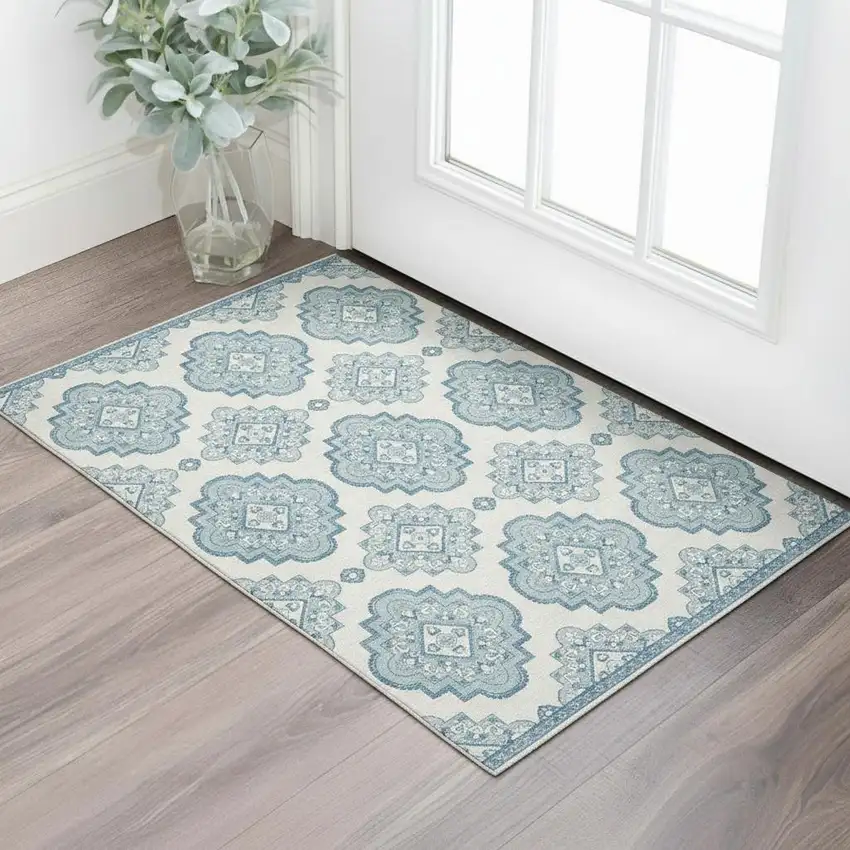 Teal And Ivory Medallion Washable Area Rug With UV Protection Photo 1